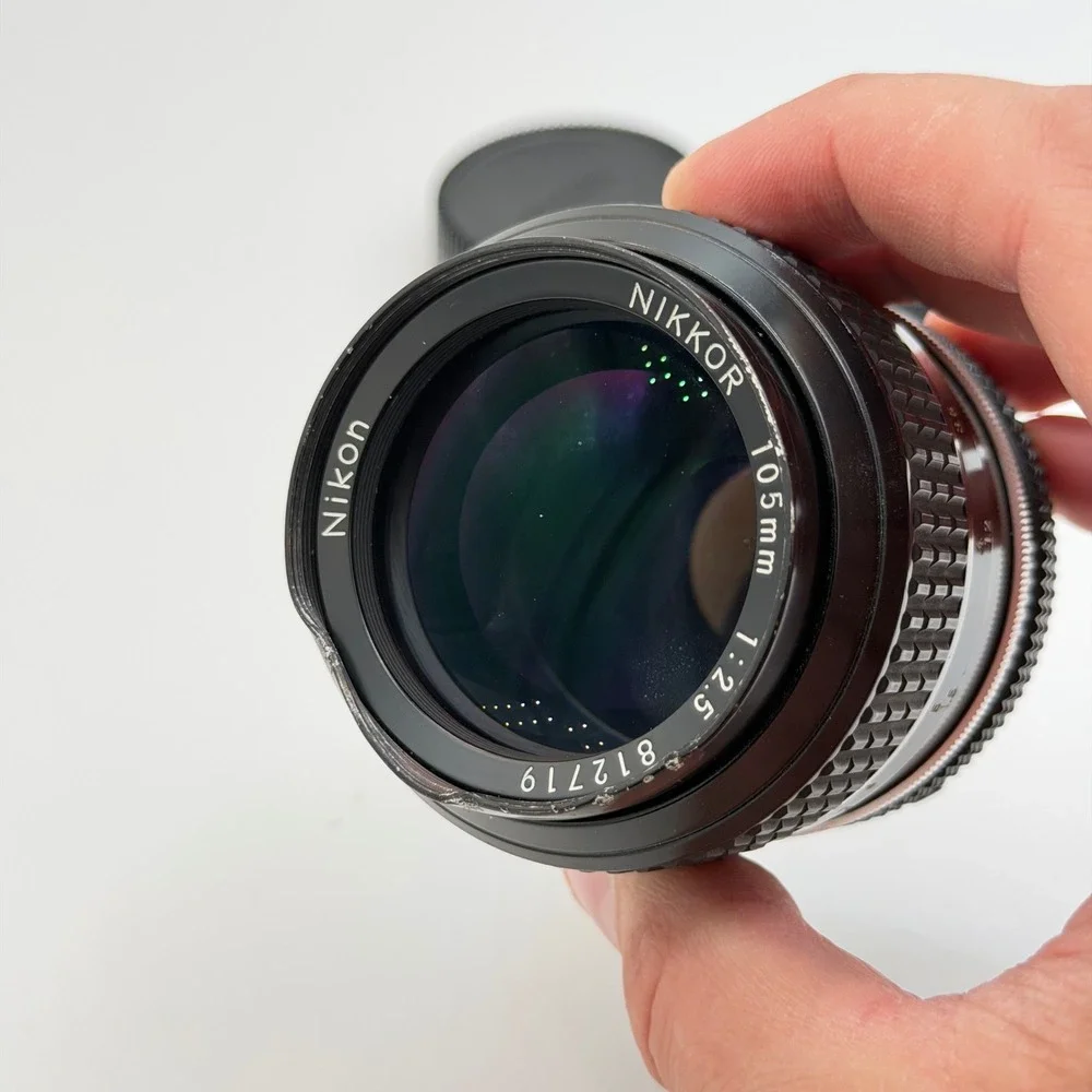 Nikon Nikkor 105mm f2.5 AI Manual Focus Portrait Lens F-Mount W/ Caps 812719